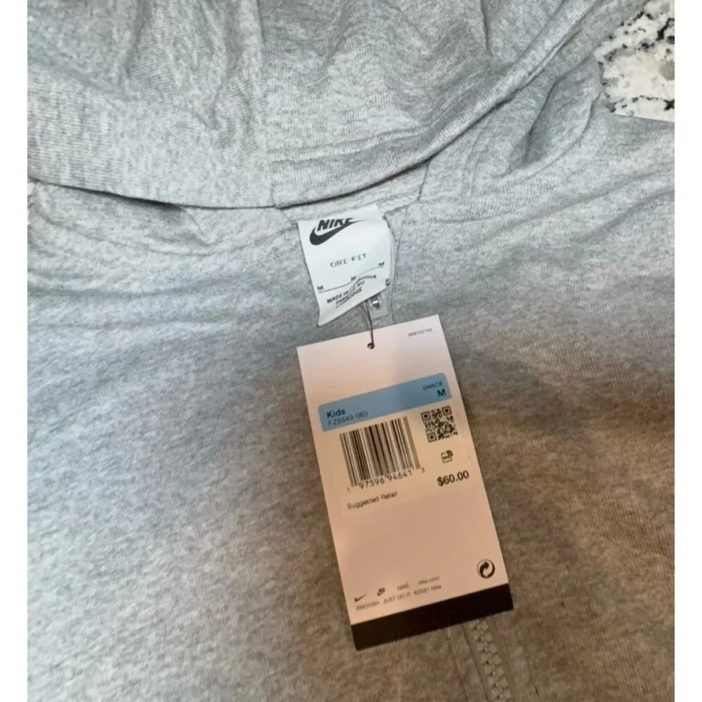 Kids size MEDIUM NIKE oversized fit gray zip up hooded jacket.